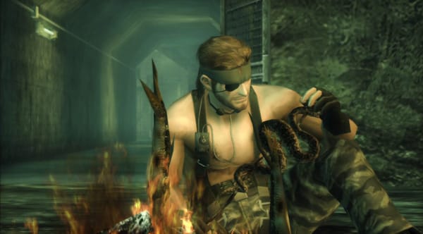 Screenshot from Metal Gear Solid 3, in which the main character Snake sits in a cave with his shirt off, eating cooked snake.